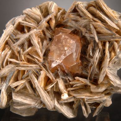 Fluorite (Pink- Orange Octahedral) on Muscovite