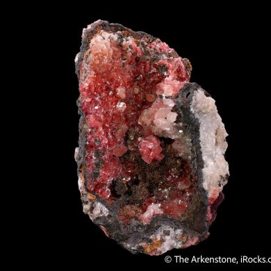 Calcite included by Cuprite var. Chalcotrichite