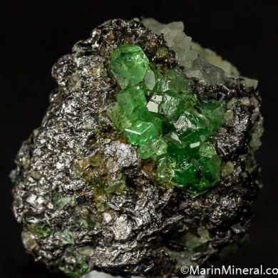 Tsavorite on Graphite