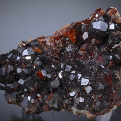 Spessartine with minor Hyalite Opal