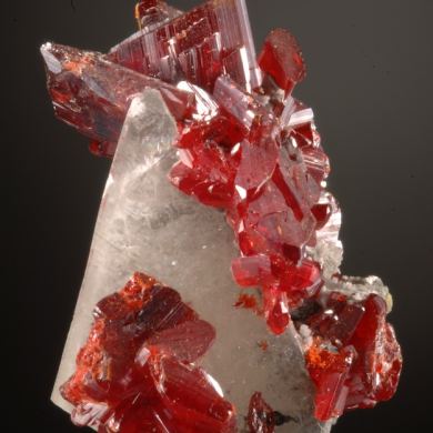 Realgar crystals on Calcite