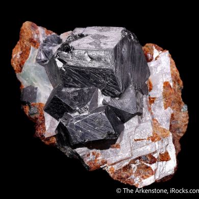 Magnetite on Calcite with Chondrodite