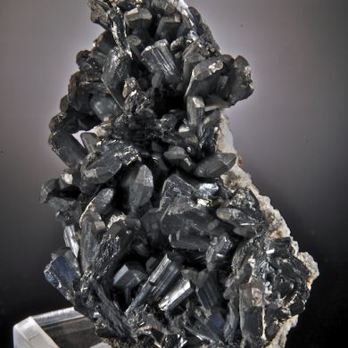 Stibnite - flattened prismatic crystals with Barite, Quartz
