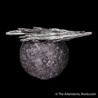 Stibnite on Calcite included by Boulangerite