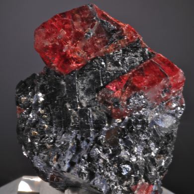 Rhodonite (doubly terminated crystal included by Galena)