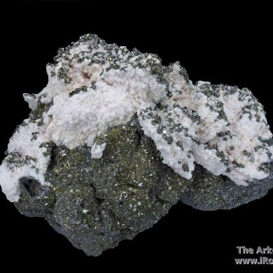 Manganoan Calcite (fl) on Tennantite and Sphalerite, with Pyrite