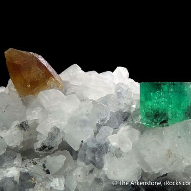 Beryl var. Emerald and Parisite-(Ce) on Calcite