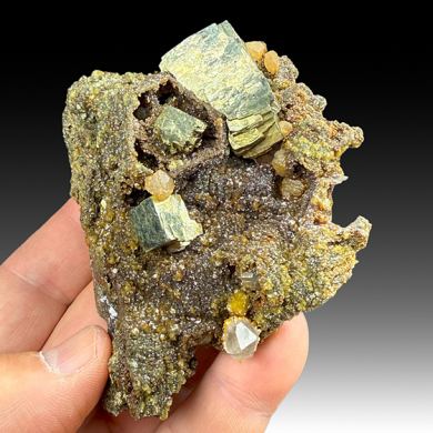 Pyrite with Siderite after Pyrrhotite, Quartz