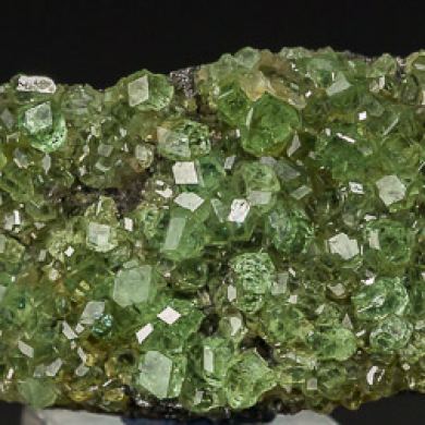 Tsavorite on Graphite