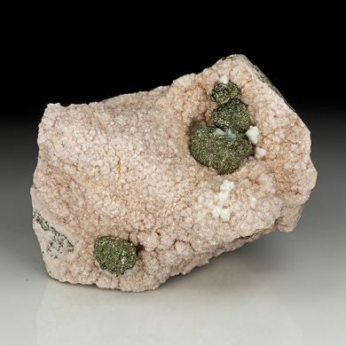 Rhodochrosite with Pyrite after Pyrrhotite