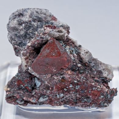 Zunyite with Hematite