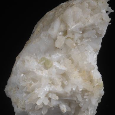 Milarite on Valencianite and Quartz