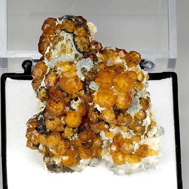 Spessartine with Muscovite, Albite