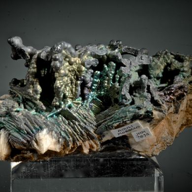Psilomelane - iridescent, on Barite