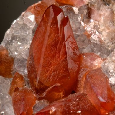 Rhodochrosite -Scalenohedral crystals on Quartz