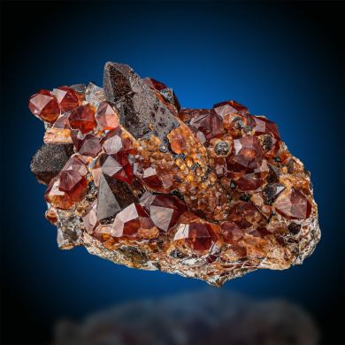 Spessartine  on Smoky Quartz