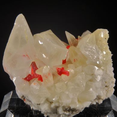 Realgar in and on  Calcite