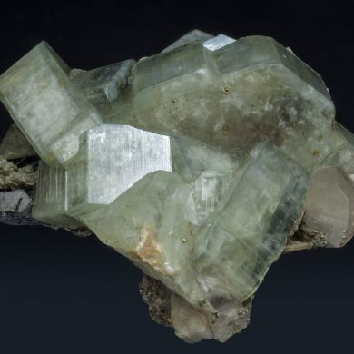 Fluorapatite with Ferberite, Siderite, Quartz and Muscovite