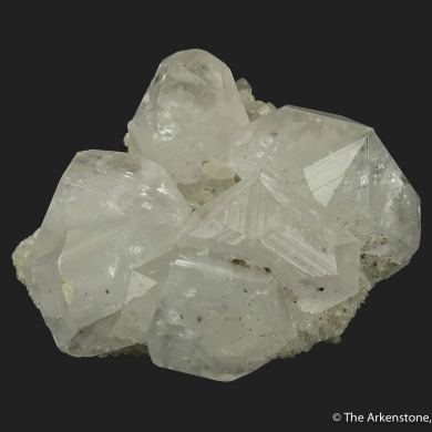 Calcite (fluorescent) on Quartz