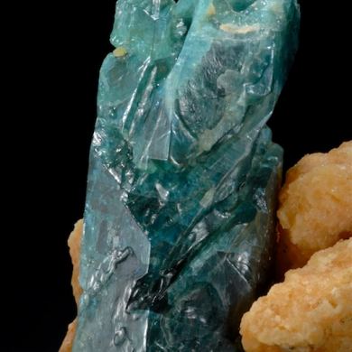 Fluorapatite -large etched crystal in Calcite