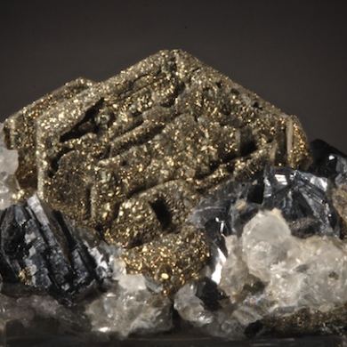 Pyrite pseudo after Pyrrhotite with Galena and Calcite
