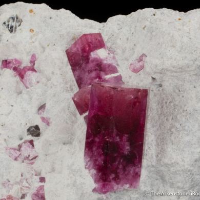 Beryl var. Red Beryl on Rhyolite