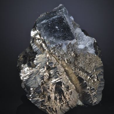 Bismuthinite inside Fluorite on Arsenopyrite