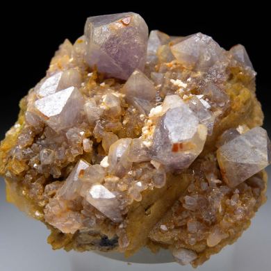 Herderite on Siderite