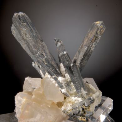 Stibnite on (and in)  Fluorite Cubes